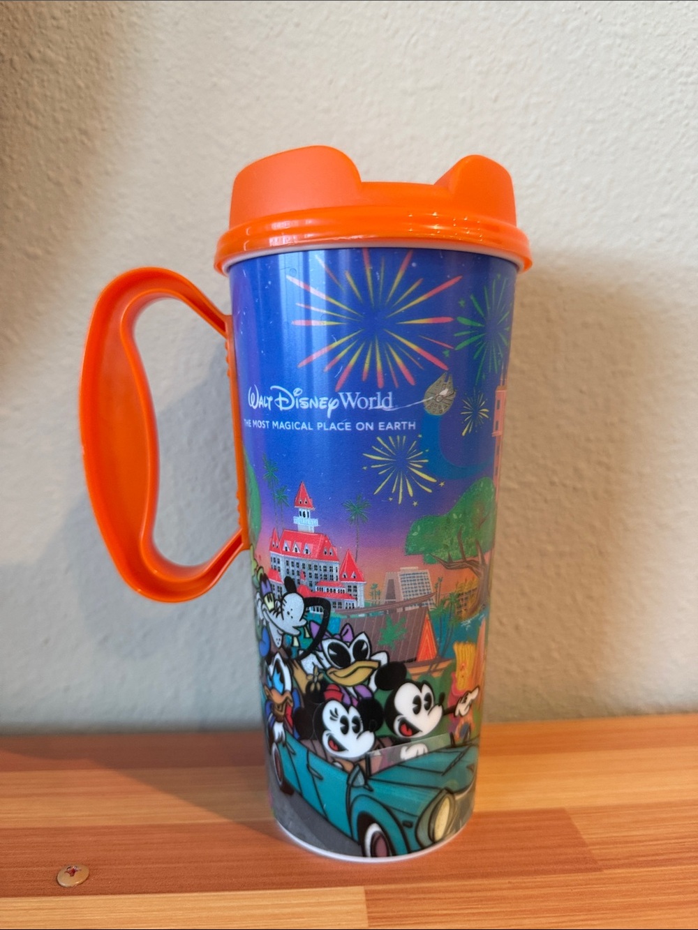 Disney Orange-Handled Mickey & Friends Travel Cup with Fireworks Art